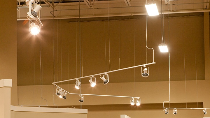 Ashley Furniture HomeStore lit with Track heads using LED Lamps