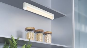 Clip-on lamp in a storage closet